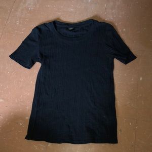 Women’s black ripped crew neck tee